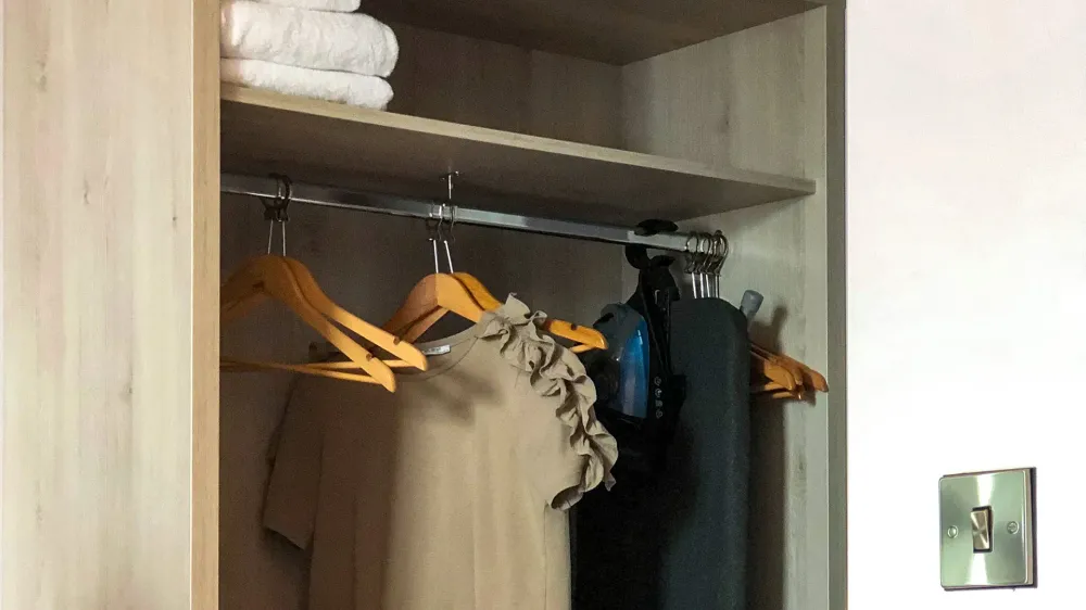 hanging shirt or dress hangers closet hotel room